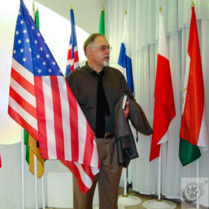 Ron and the USA flag at a global conference in Krasnoyarsk, Siberia – RU.