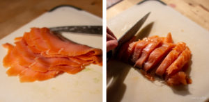 Smoked salmon being sliced.