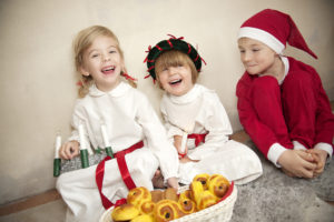 Young Swedish children enjoying St. Lucia festivities. 