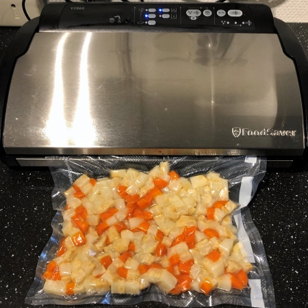 Diced veggies in a vacuum bag. Diced veggies in a vacuum bag.