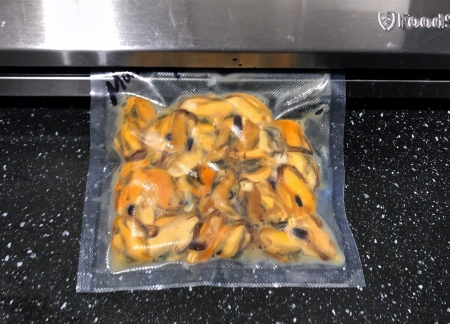 Cooked mussels in a vacuum pack. Cooked mussels in a vacuum pack.