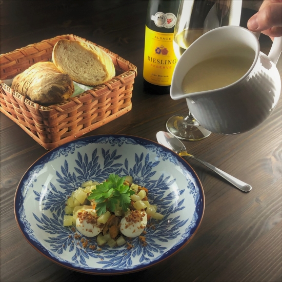 Pouring the mussel bisque. Pouring the mussel bisque.