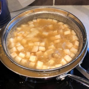 Poaching the veggies in fish stock. Poaching the veggies in fish stock.