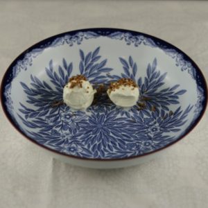 Placing the smoked cream cheese in the bowl. Placing the smoked cream cheese in the bowl.